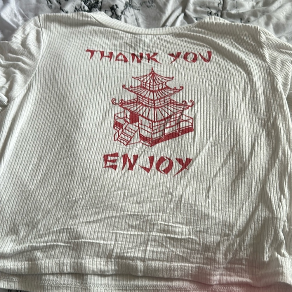 I am selling this cute shirt in the color white